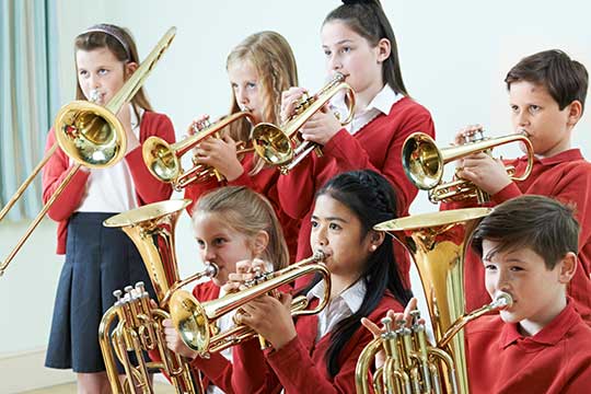 Class having trumpet music lesson